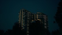 Skyscraper Building Illuminated At Night In A City