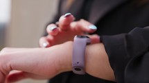 Hand Of A Girl Touches The Smartwatch