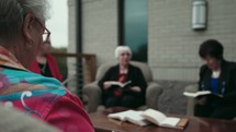 senior women having a Bible study 