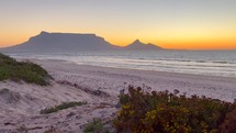 Stunning golden orange sunset view of Table Mountain Cape Town South Africa 