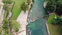 Tubers Going Down Rapids on Comal River.