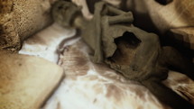 Egyptian Mummy Lay Between Ancient Ruins