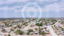 Aerial View On Tower Of Cell Phone Antenna With Highway Background