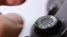 Setting mode dial lock button of the camera reflex - macro