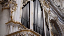 Ancient pipe organ inside a church
