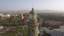 Maspalomas Lighthouse against ocean background, aerial