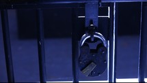 padlock on a prison cell 