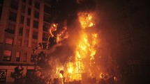 A slowmotion of a huge burning bonfire on the Falles night in Valencia