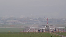 Time lapse video of Swiss Airlines commercial airplanes taking off a runway.