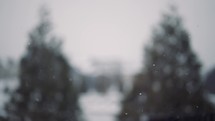 Snow falling in slow motion on a cold winter's day