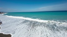Ocean Waves on sandy beach 