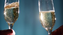 celebrating new Year with sparkling wine glasses 