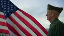 Elderly Man Stand Against American Flag For Veterans Day Holiday