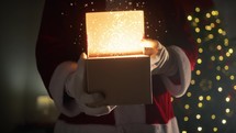Particles coming out of a present in the hands of Santa 