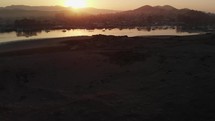 drone view of morro bay harbor at sunrise
