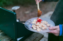cooking seafood on a camping stove 