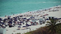 People relaxing at the beach in Miami Beach, Florida