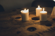 three burning candles 