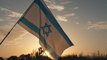 Israel Flag On the beach At sunrise