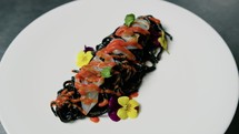 Black Cuttlefish Ink Spaghetti Pasta With Shrimps And Cherry Tomato First Course