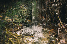 flowing water entering a stream 