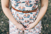 a woman in a vintage dress with bicycle print 