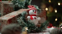 Small snowman decoration on Christmas gifts 
