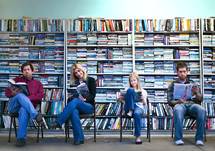people reading in a library