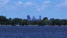 timelapse of boats on the lake and skyline 