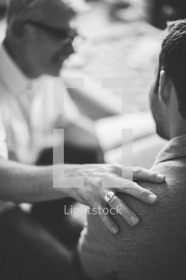 Men sharing at a Bible study.