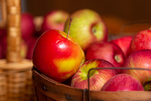 red apples in a basket 