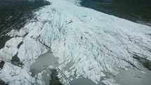 Flying Over A Huge Glacier In The Mountains