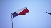 Texas flag blowing in the wind 