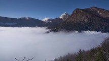 Winter mountain landscape in the Carpathians, low clouds moving to the valley.Snow-covered landscape 