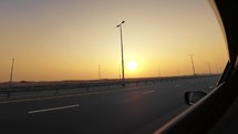 Travel By The Dubai Highway At Sunset
