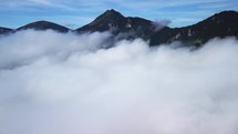 Flying Over Mountain Alpine Landscape Misty Low Clouds