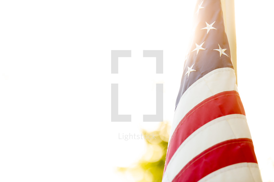 American flag with glowing sunlight