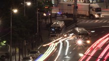 Timelapse of night car traffic on busy streets 