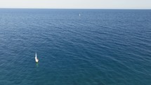sailboat sails in the sea