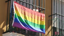 LGBTG+ Rainbow LGBT Pride Flag on Building Window