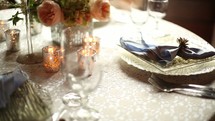 elegant place settings on a table at a wedding reception 