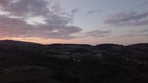 Aerial View Pan of Sunset Over a Valley and Woodland, Glencullen, Enniskerry
