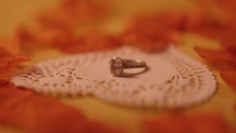 Valentine's Day engagement ring on a heart shaped cloth
