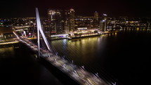 Timelapse of car traffic on Erasmus bridge in night Rotterdam