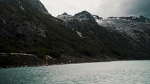 Mountain Hikes Of Lake Emerald Near Ushuaia In Tierra de Fuego National Park In Argentina Patagonia. Wide Shot