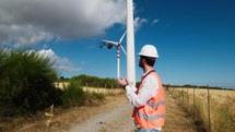 Aerospace Engineer checks the aerodynamics of wind turbines with drone