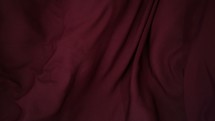 flowing purple magenta fabric background