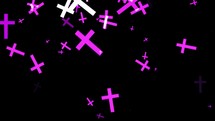 Particles of purple religious crucifixes pass on the black background