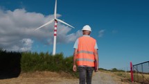 Senior engineer checks the operation of the new wind turbines