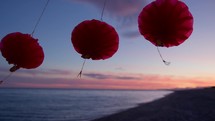 Silhouette Of Chinese Lantern At Sunset